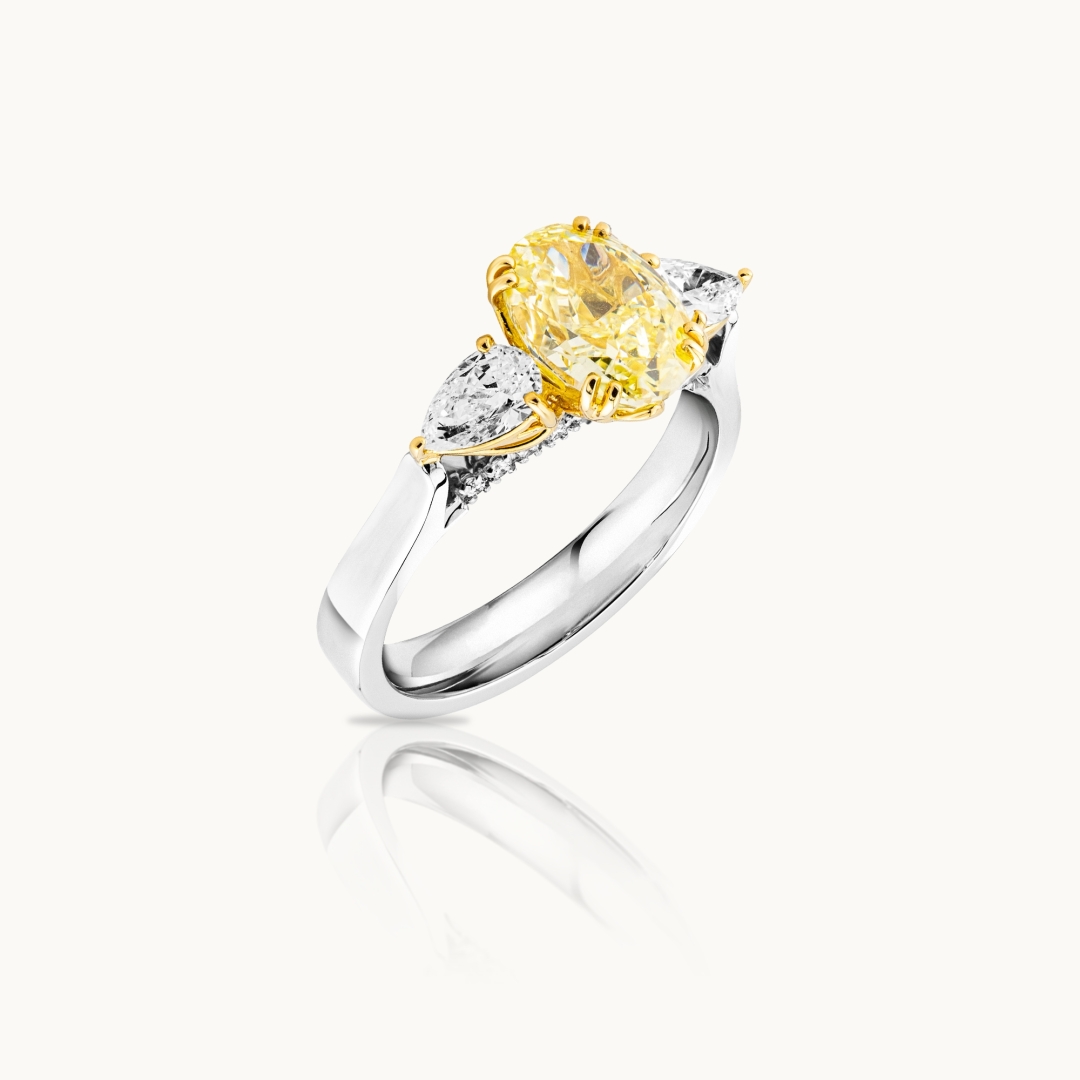 Oval Cut Colored Diamond Engagement Ring